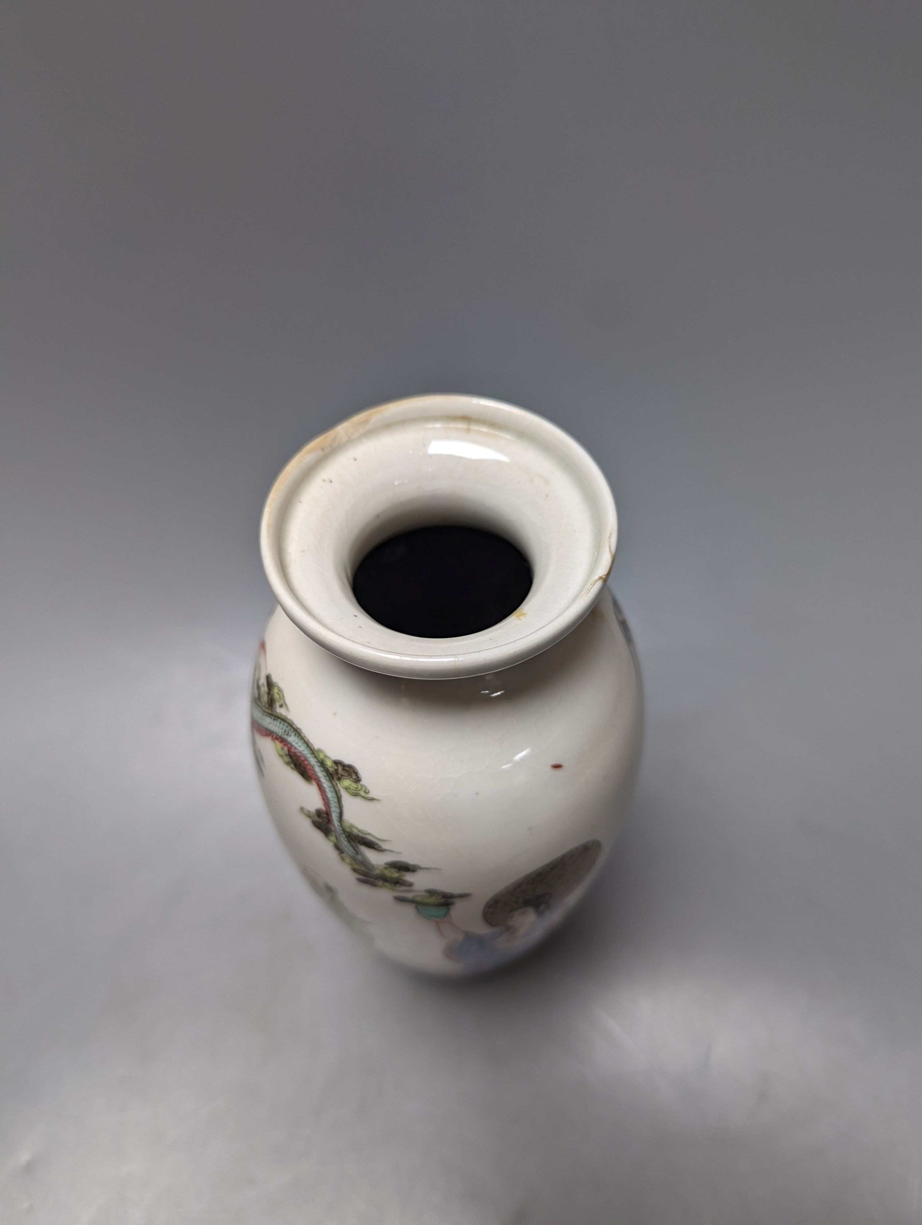 An unusual Worcester polychrome enamelled vase, c.1755-60, of unusual shape, finely painted with a Chinese immortal summoning a dragon with two sages and a boy, 24cm high, cracked, rim faults